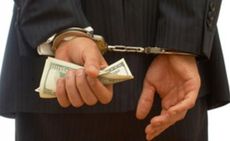 Former executive charged with foreign bribery scheme