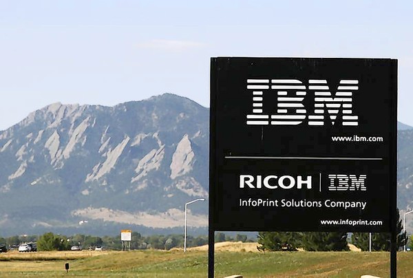 The sign at the IBM facility near Boulder, Colorado is seen with the Boulder Flatiron mountains in the background